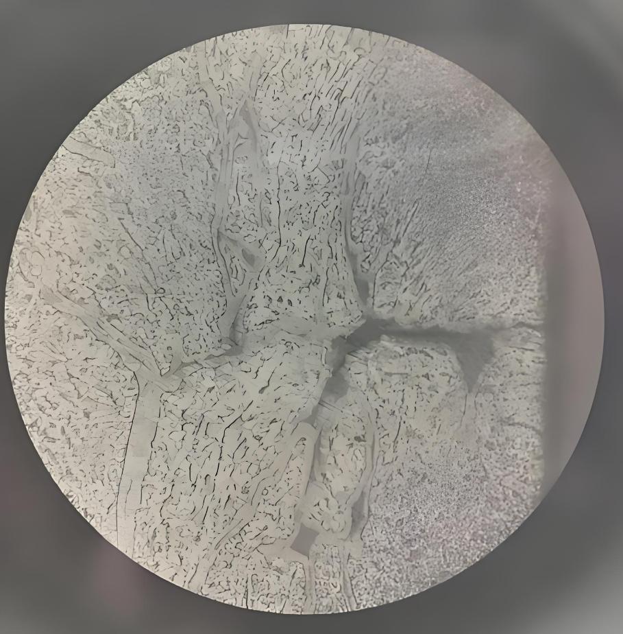 Cracks in metal under microscope